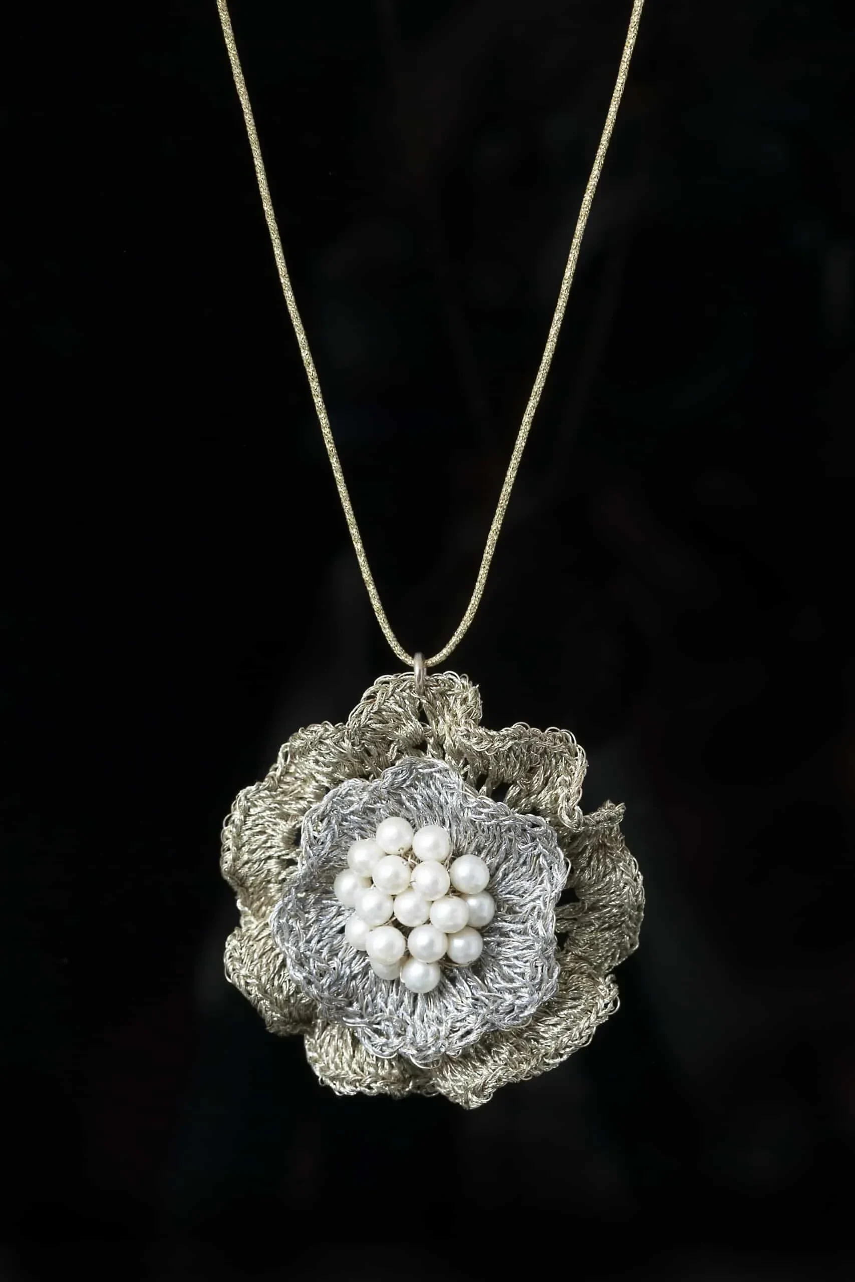 Handmade Jewellery | Flower crochet knit silver pendant with golden thread and pearls gallery 1