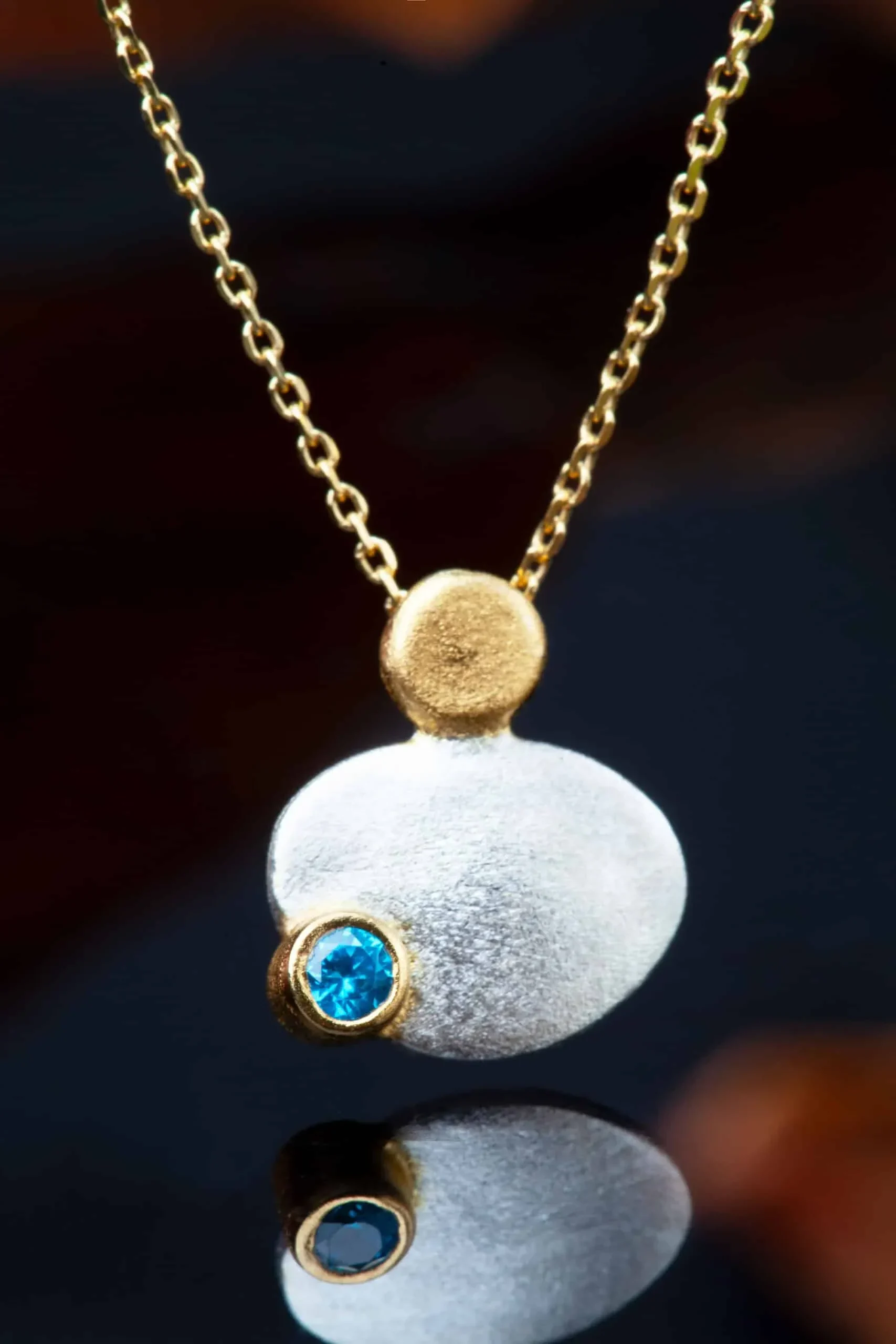 Handmade Jewellery | Round silver necklace with blue zircon gallery 2