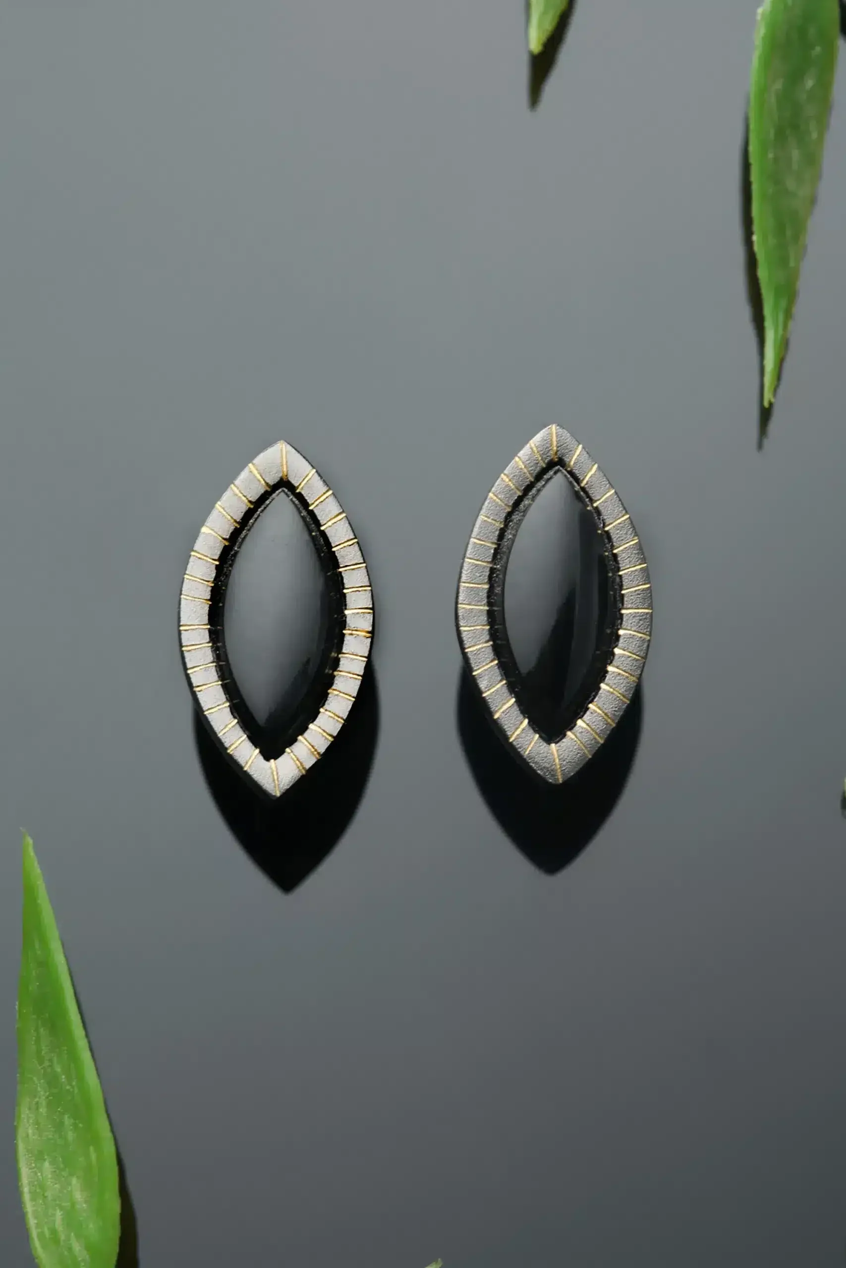 Handmade Jewellery | Engraved bronze earrings, black rhodium plated. Silver push back main