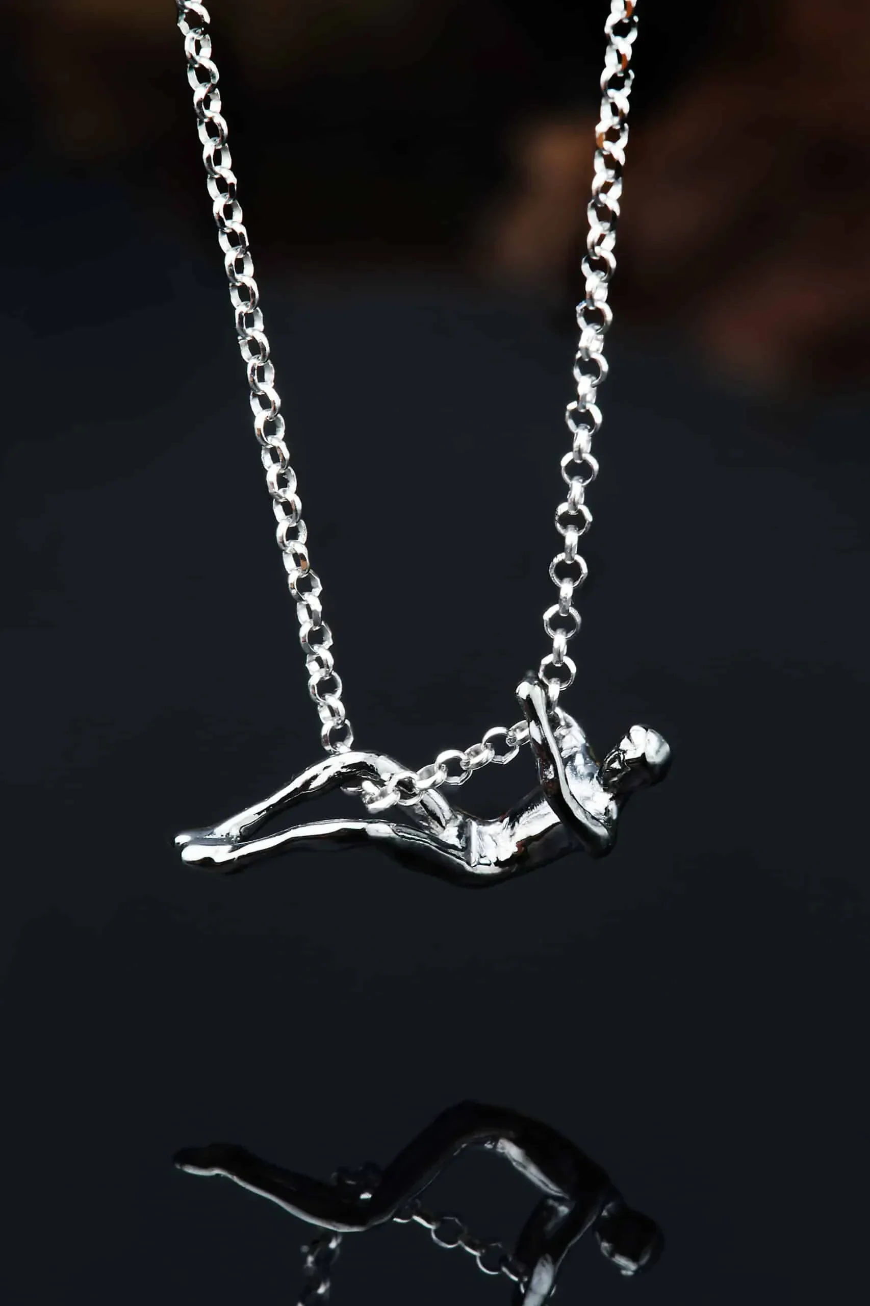 Handmade Jewellery | Male figure rhodium plated silver necklace gallery 1