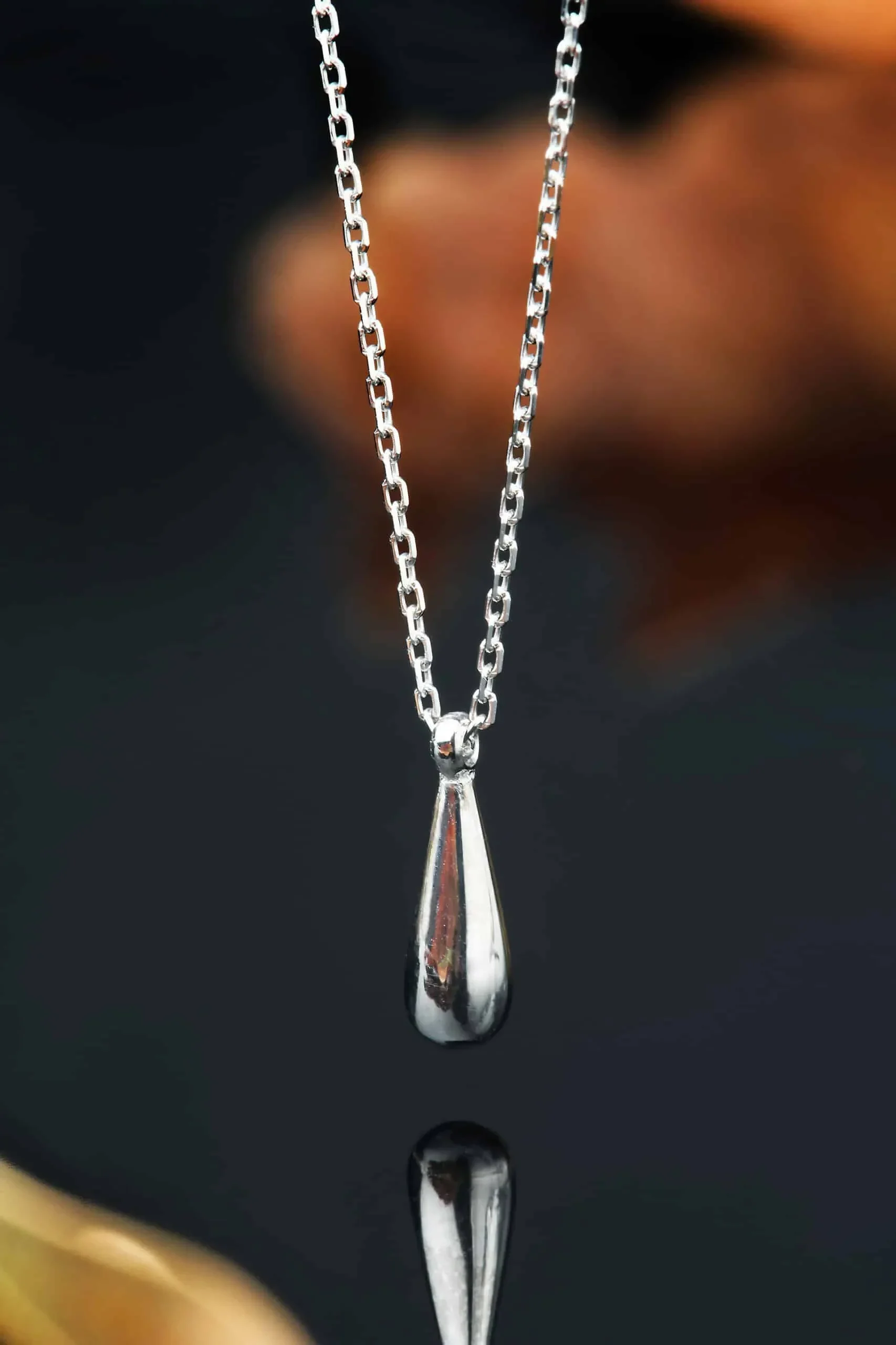 Handmade Jewellery | Drop rhodium plated silver pendant gallery 1