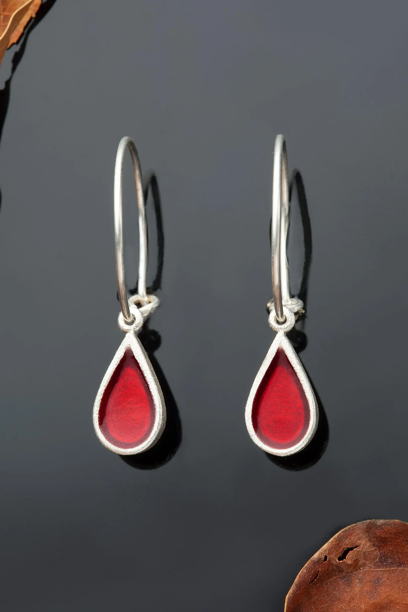 Handmade Jewellery | Drops silver hoops with red enamel gallery 1