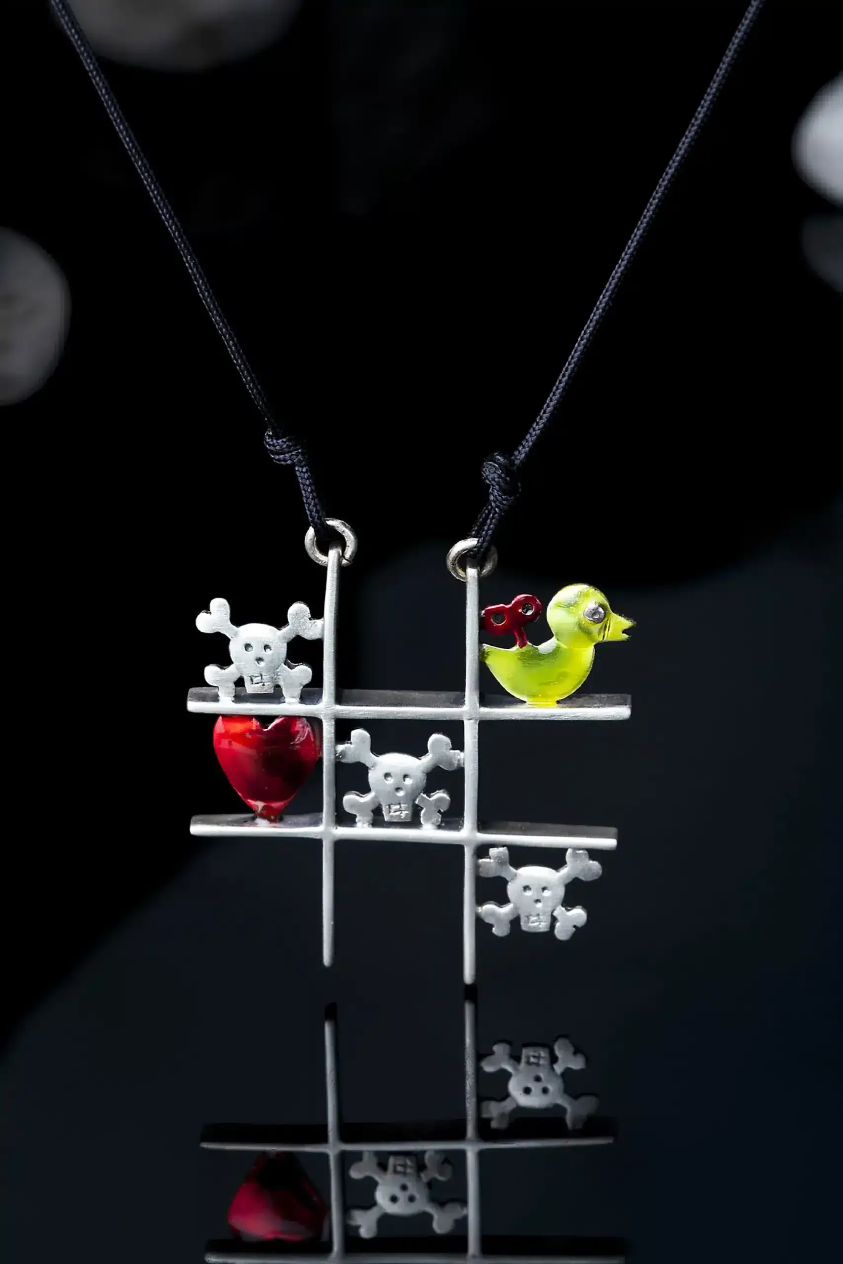 Handmade Jewellery | Tic tac toe oxidized silver necklace with enamel gallery 1