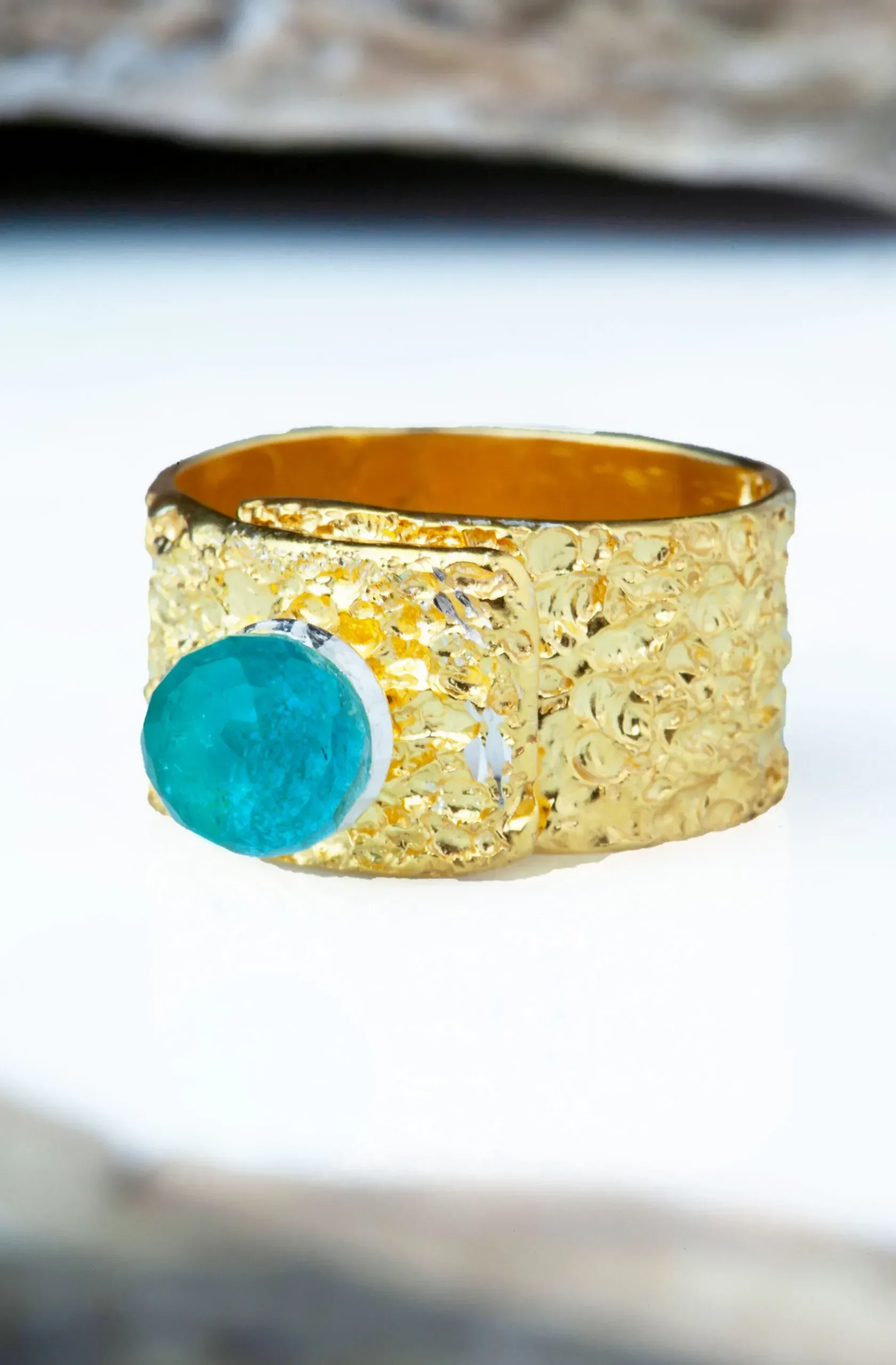 Handmade Jewellery | Gold plated textured silver ring with blue crystal gallery 1