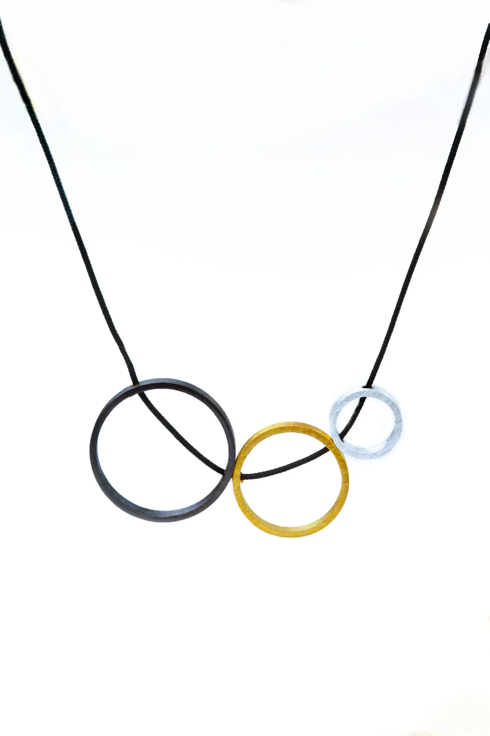 Handmade Jewellery | Circular geometric multi plated bronze necklace gallery 1