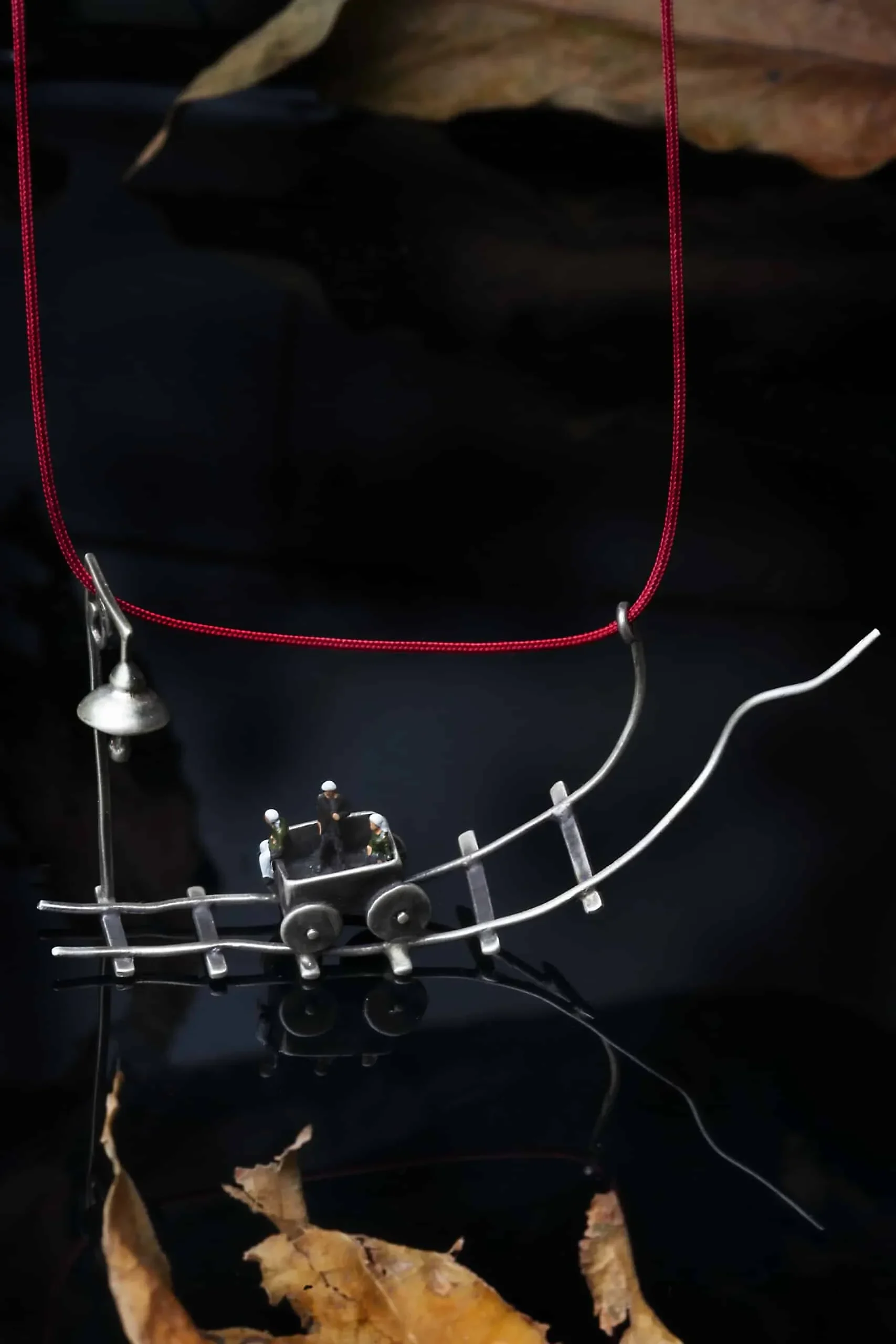 Handmade Jewellery | Train silver long necklace with mini figures gallery 1