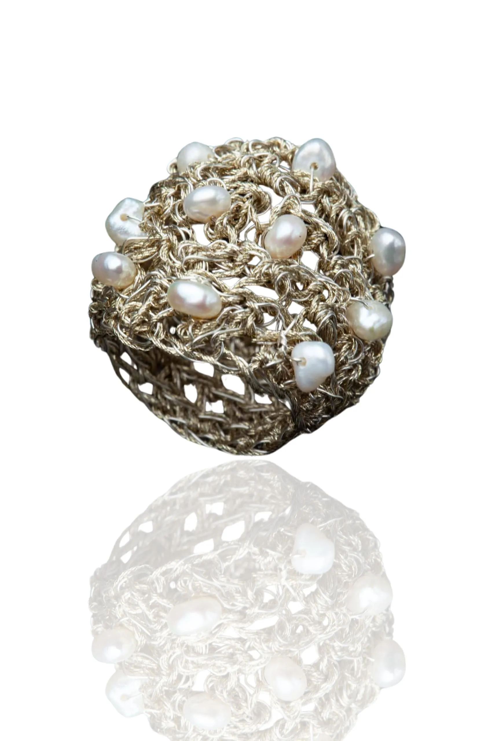 Crochet knit silver ring with golden threads and pearls