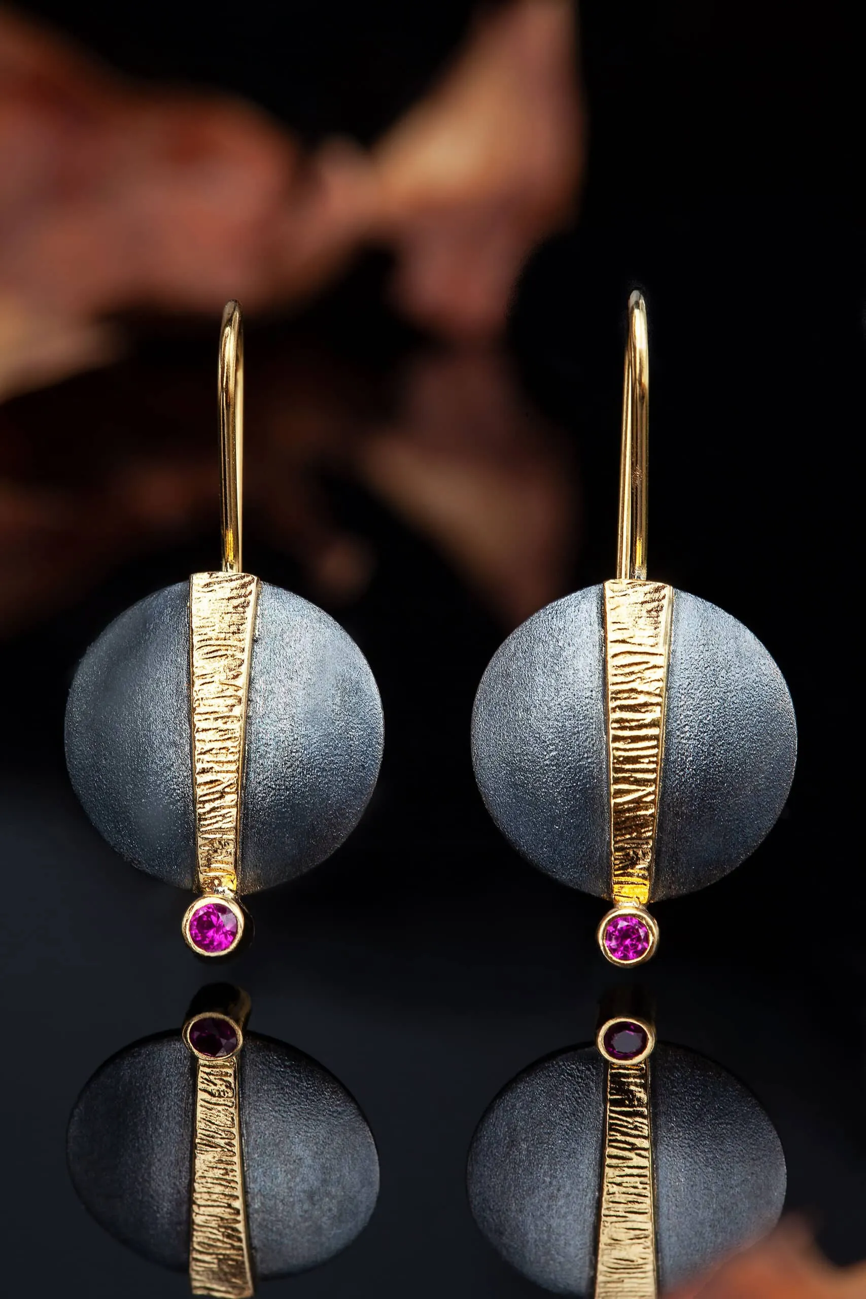 Handmade Jewellery | Round handmade silver earrings with fuchsia zircon, gold and black rhodium plated. gallery 1