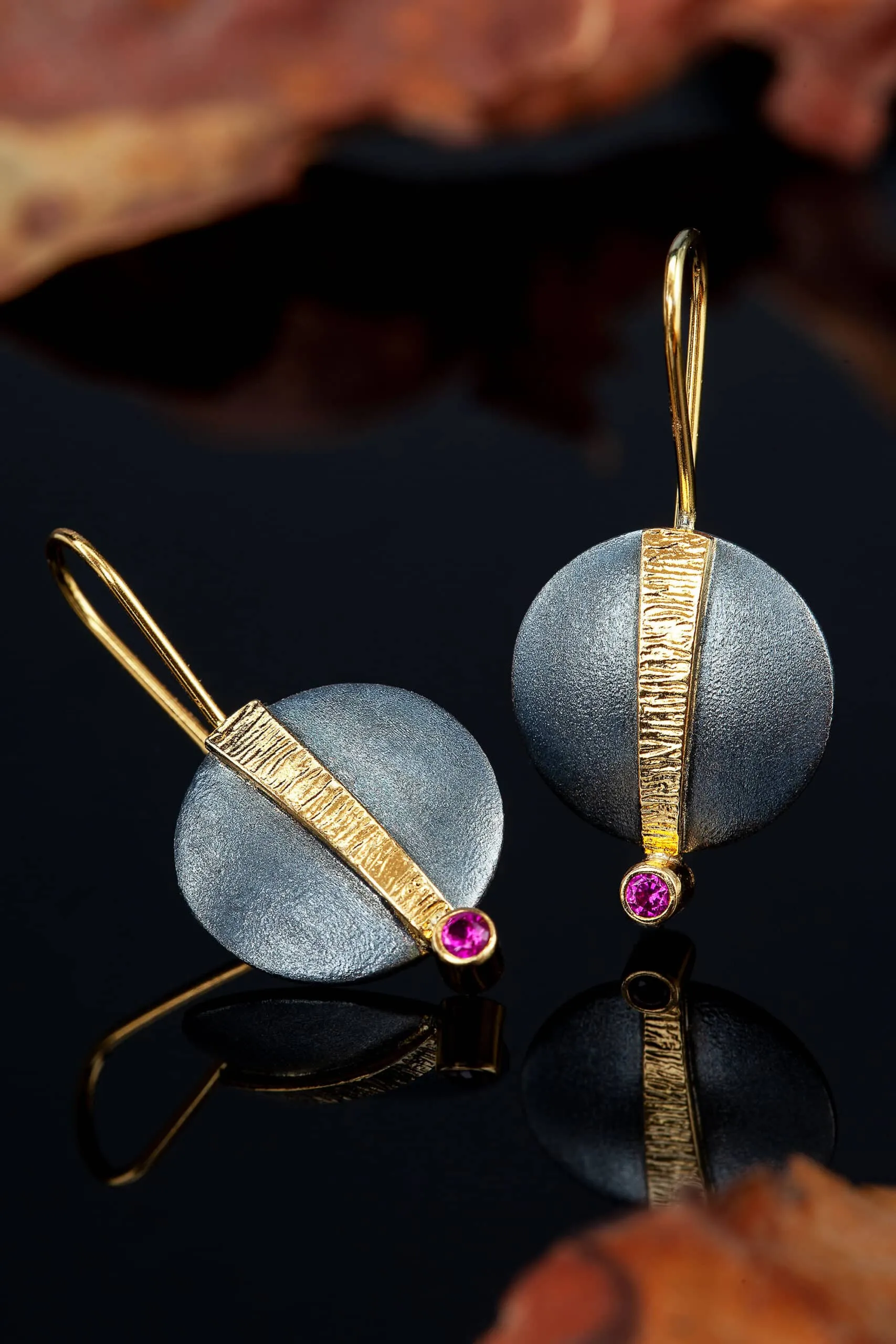 Handmade Jewellery | Round handmade silver earrings with fuchsia zircon, gold and black rhodium plated. gallery 2