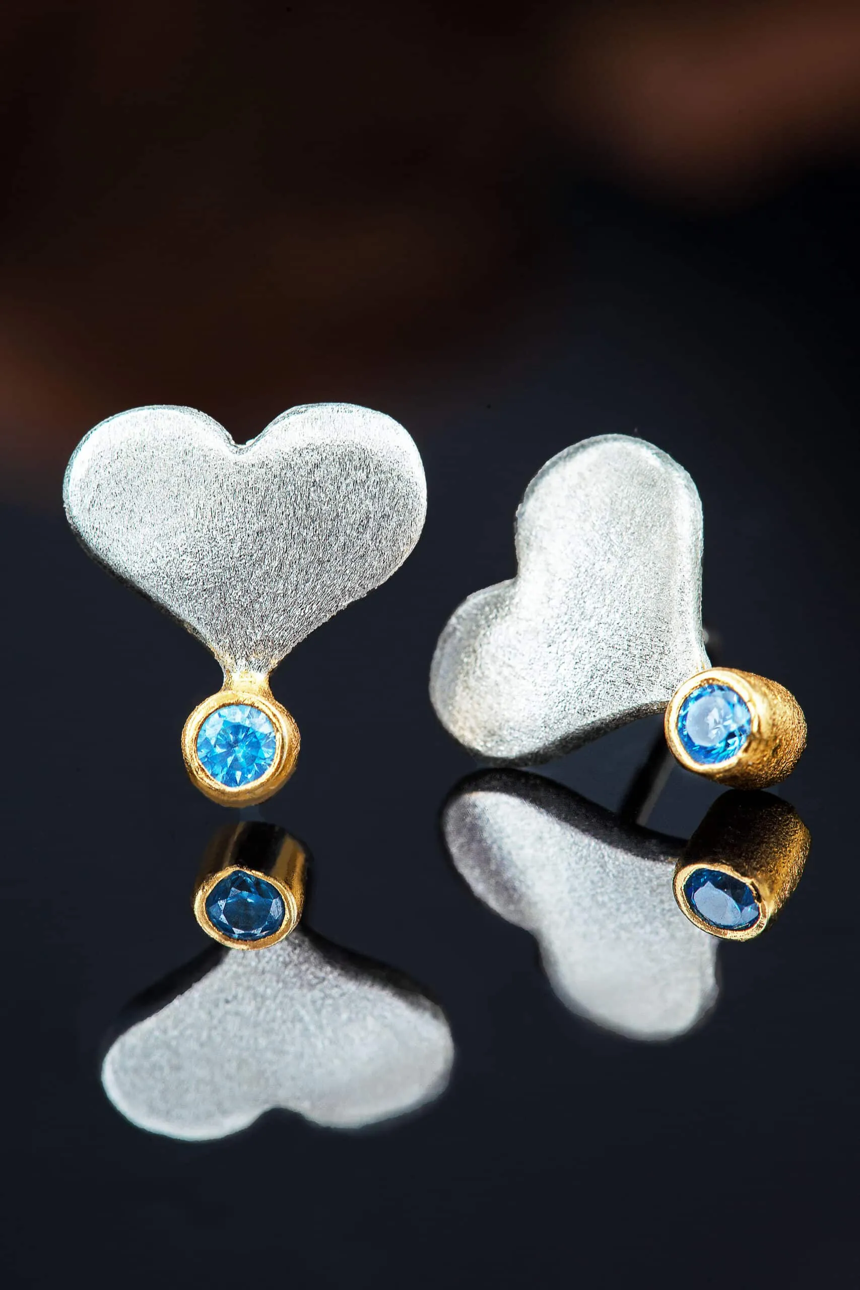 Handmade Jewellery | Hearts handmade silver earrings with light blue zircon gallery 1