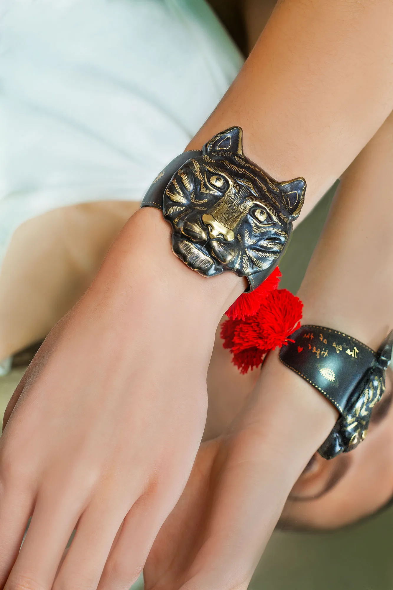 Handmade Jewellery | Tiger handmade engraved bronze bracelet with red tassels gallery 2