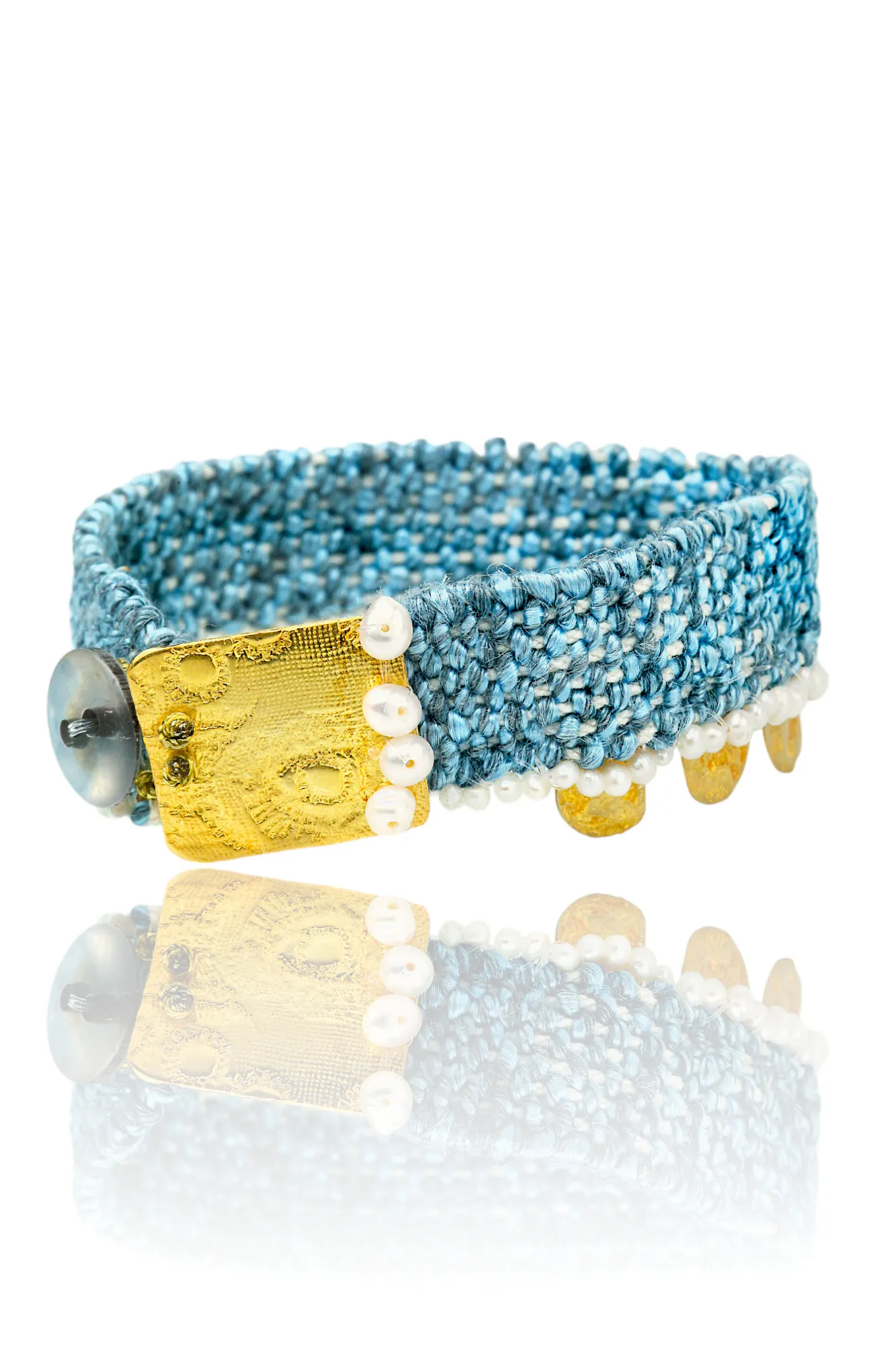 Woven bracelet with gold plated silver and pearls