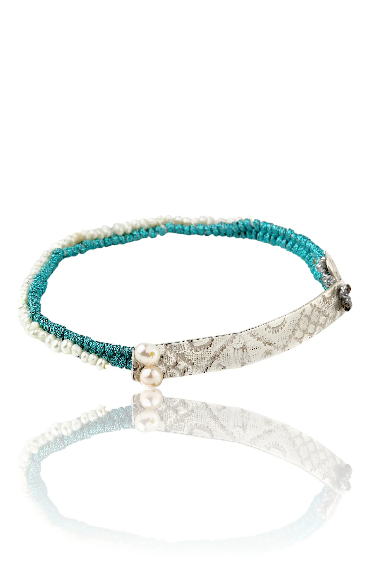 Woven turquoise bracelet with silver and pearls