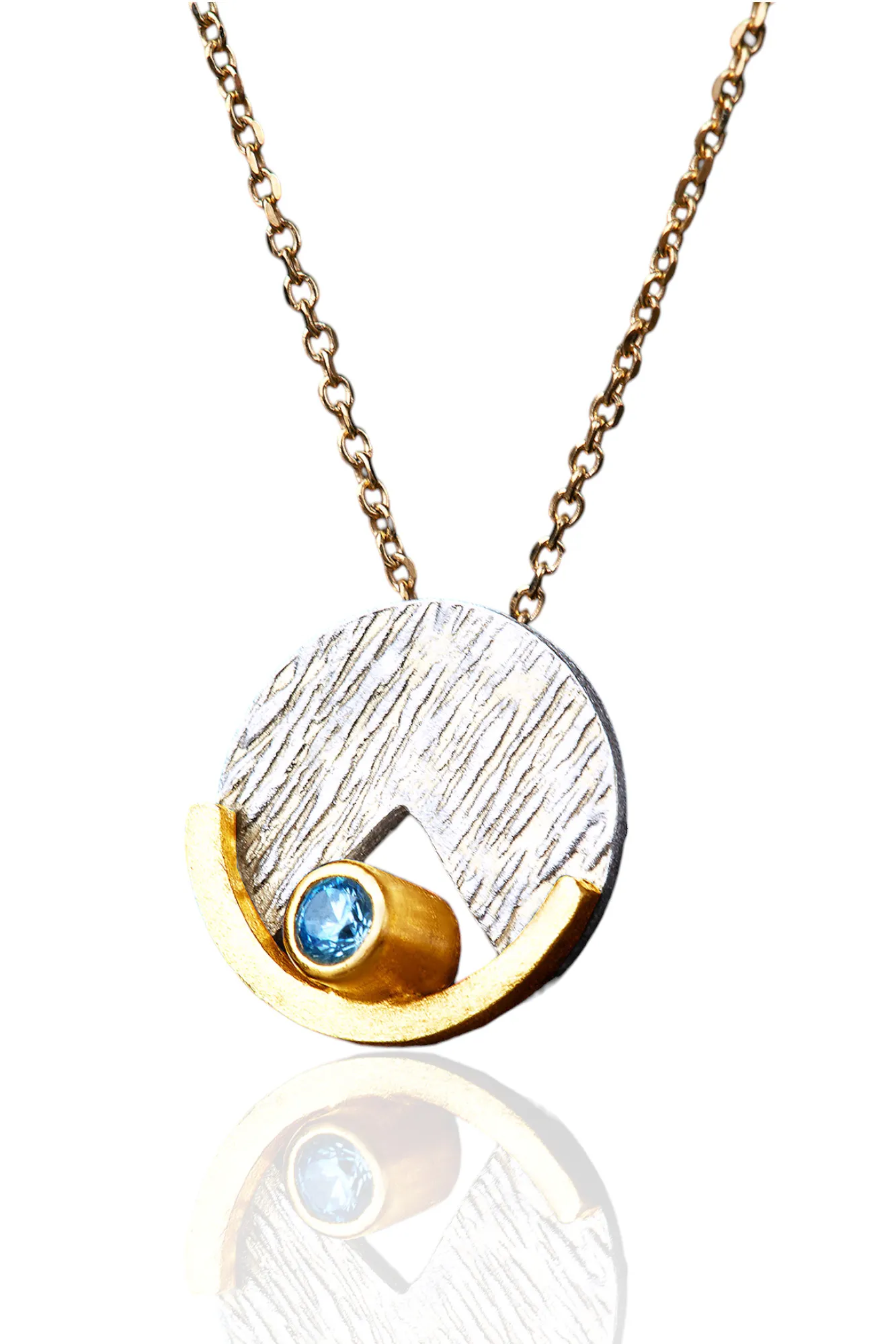 Round textured handmade silver necklace with blue zircon