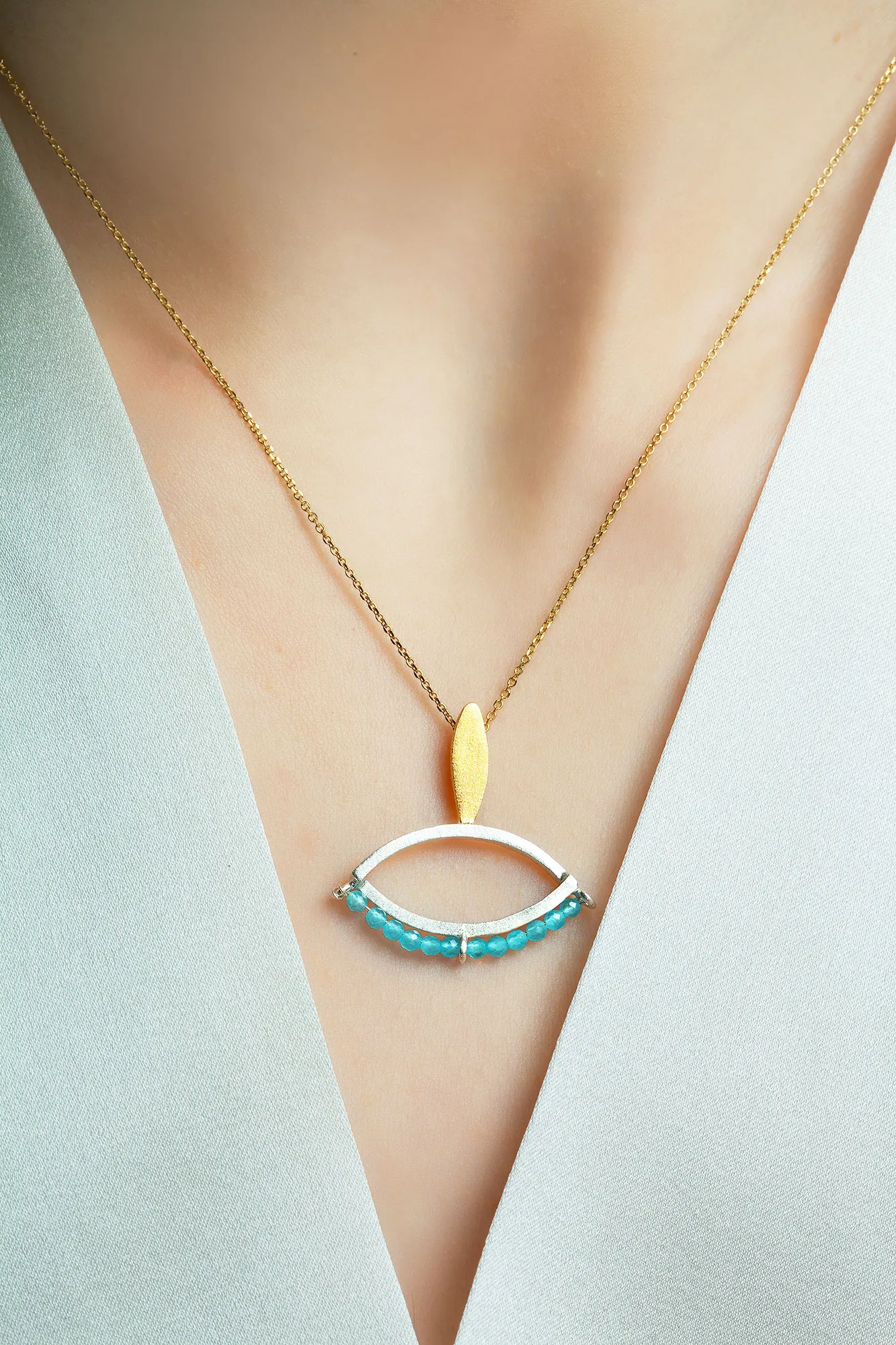 Handmade Jewellery | Minimal eye handmade silver necklace with aqua marine gallery 1