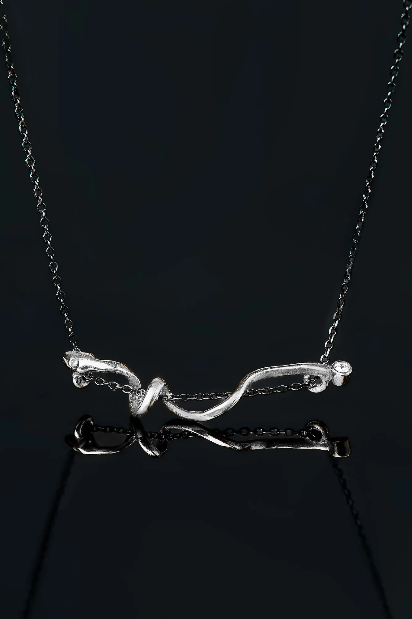 Handmade Jewellery | Snake rhodium plated silver necklace with zircon gallery 1