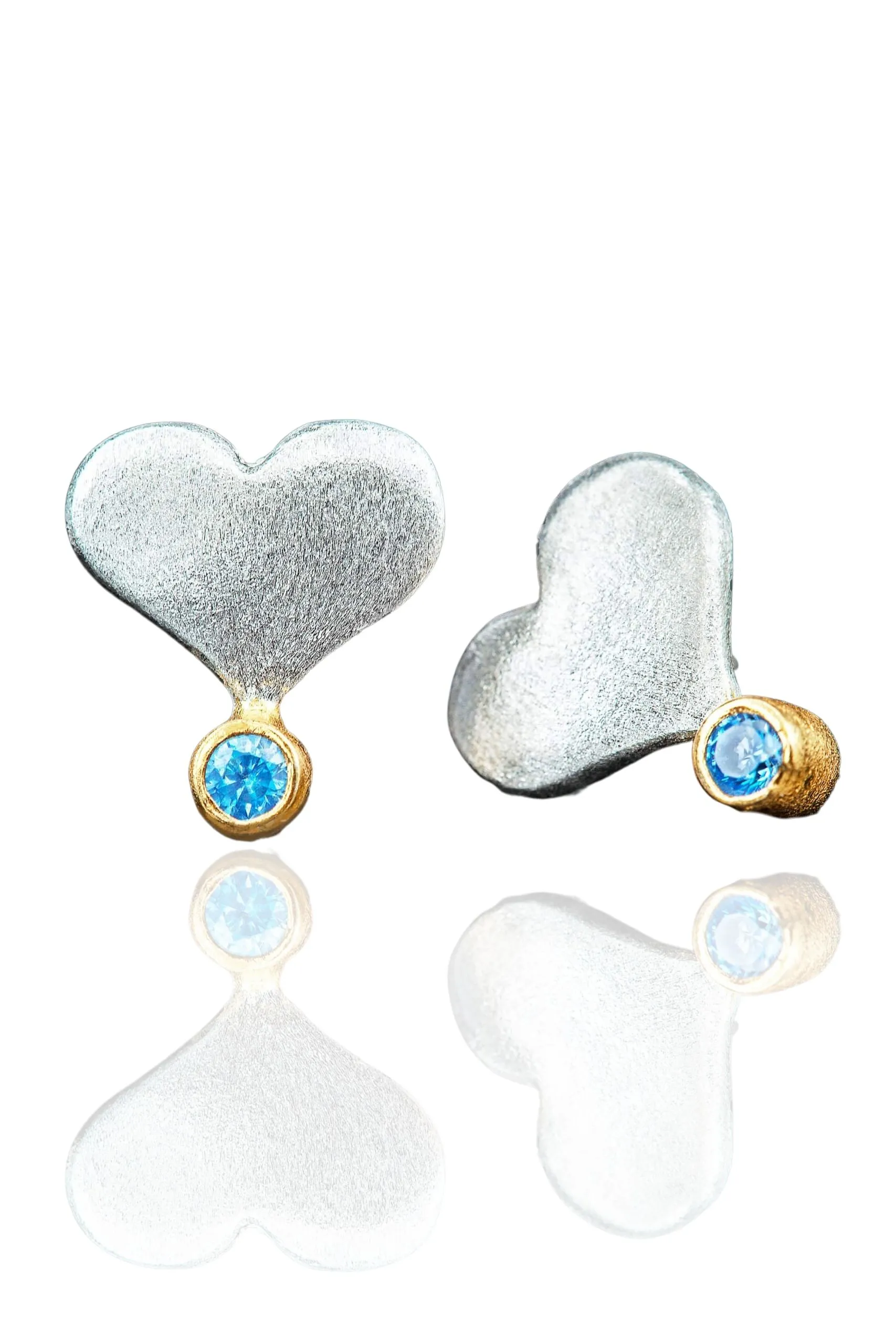 Hearts handmade silver earrings with light blue zircon