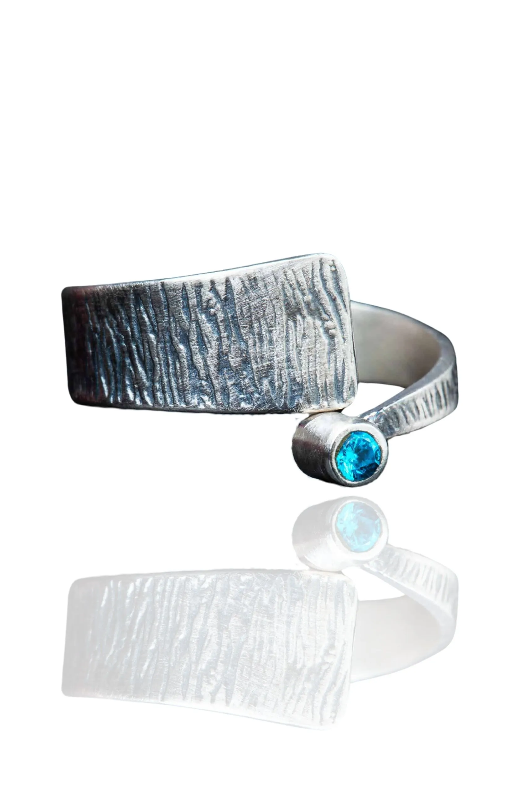 Handmade Jewellery | Minimal textured silver ring with blue zircon main