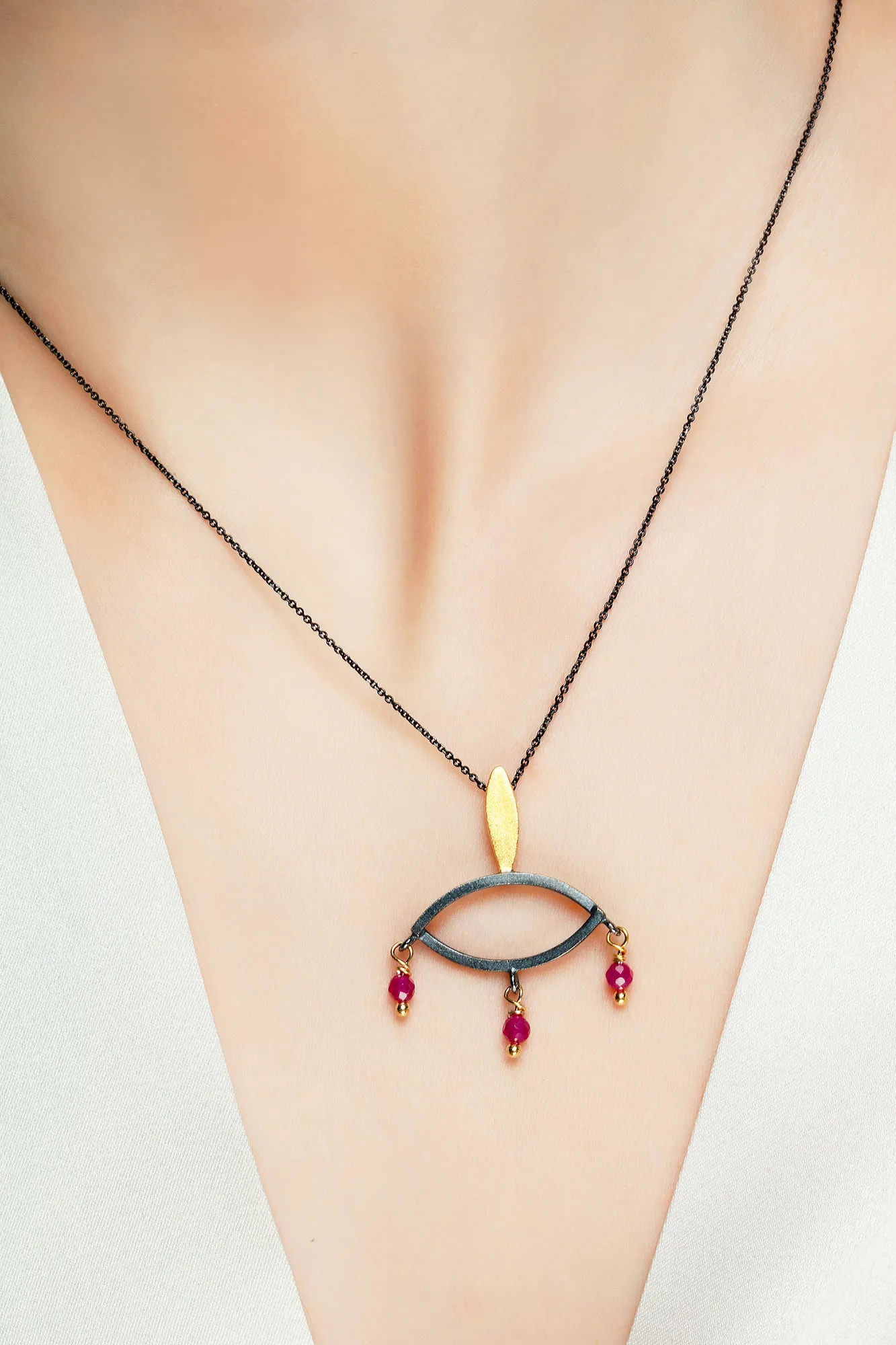 Handmade Jewellery | Handmade eye minimal necklace and rubies gallery 1